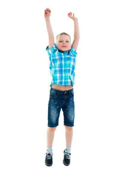 Little boy jumping.The concept of a happy childhood, sports and - Zdjęcie, obraz