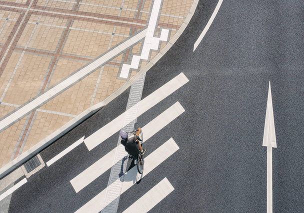 People riding bicycle Crosswalk street Pathway Aerial view Urban city - Photo, Image