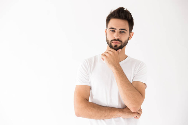 Portrait of an attractive young bearded man - Foto, imagen