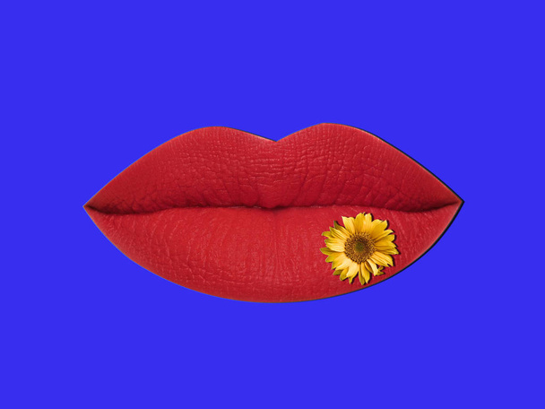 Beautiful hot red lips on a blue background. - Photo, Image