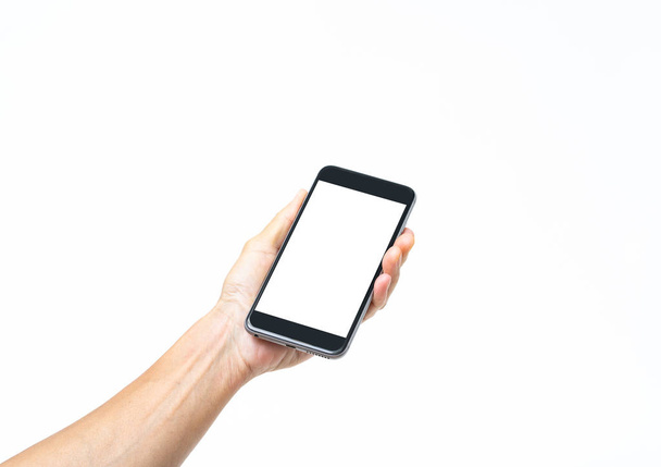 Man hand houden zwarte smartphone geïsoleerd op witte achtergrond,  - Foto, afbeelding