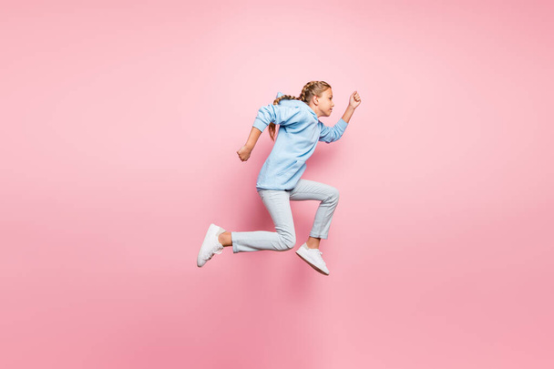 I am number one. Full length profile photo of pretty small lady jumping high running to finish line champion spirit wear casual outfit isolated pastel pink color background - Foto, immagini