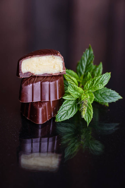Assortment of fine chocolate candies, white, dark, and milk chocolate sweets background. Copy space - Φωτογραφία, εικόνα