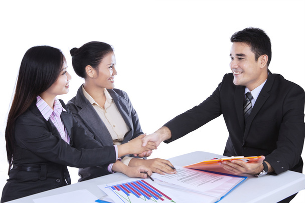 Business people shaking hands at meeting - Fotó, kép