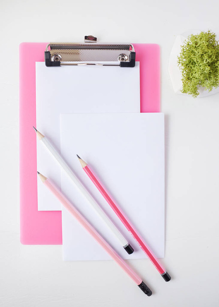 writing instruments and Clipboard pink on white background.  - Photo, Image