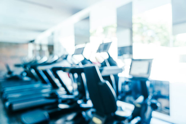 Abstract blur fitness equipment in gym interior - Φωτογραφία, εικόνα