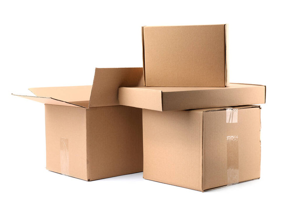 Pile of cardboard boxes on white background - Foto, Imagen