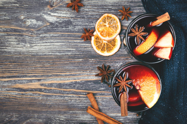 Christmas mulled wine on rustic table. Traditional drink on winter holiday. - Photo, Image