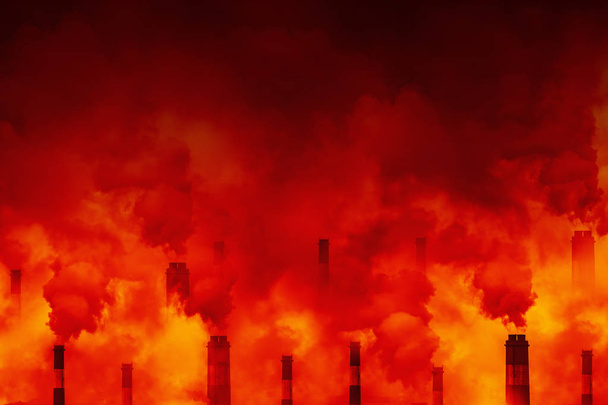 Fabryka przemysłowa emituje zanieczyszczenie powietrza dymem węglowym. Globalne ocieplenie Koncepcja kryzysu klimatycznego. - Zdjęcie, obraz