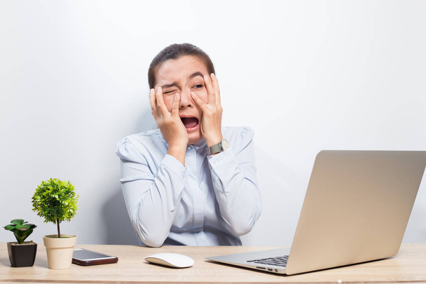 Woman has shock when she look at laptop - Photo, Image