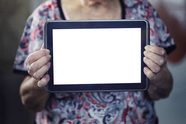donna anziana in possesso di tablet
 - Foto, immagini