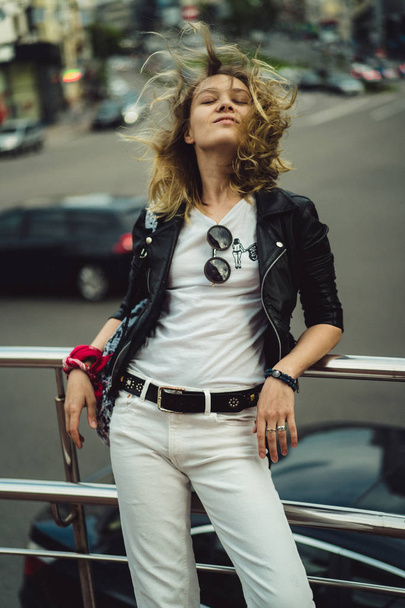 Young beautiful woman walks around the city in Europe, street ph - Fotografie, Obrázek