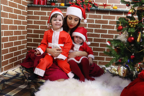 Santa Claus couple with twins - Photo, Image