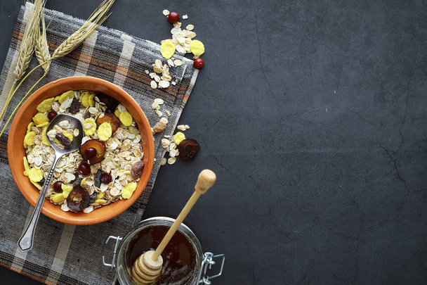 Healthy breakfast. Muesli from cereals with milk berries. - Фото, изображение