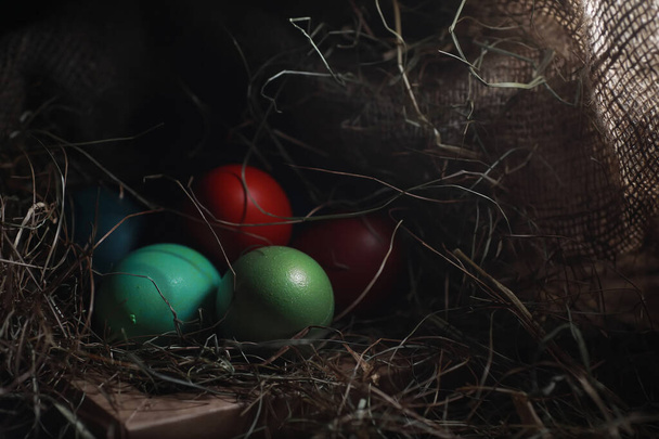 Easter painted eggs on burlap - Foto, Bild