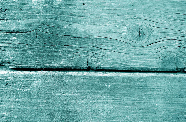 Weathered wooden painted wall in cyan color. - Photo, Image
