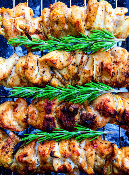 grilled barbecue with rosemary on grill, close view     - Photo, Image
