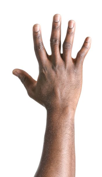 Hand of African-American man on white background - Photo, image