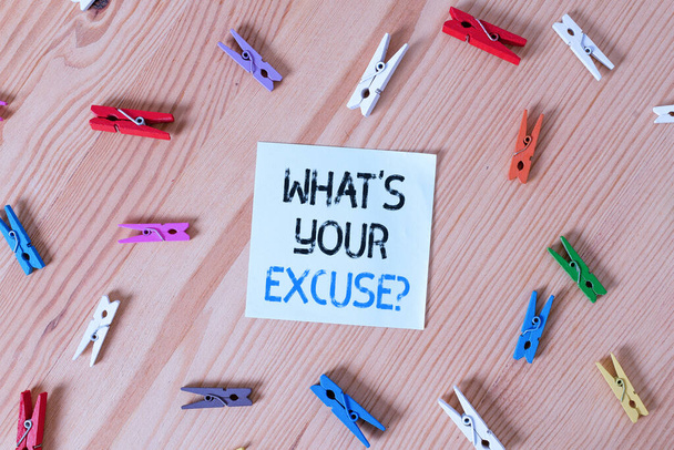 Writing note showing What S Your Excuse Question. Business photo showcasing Explanations for not doing something Inquiry Colored clothespin papers empty reminder wooden floor background office. - 写真・画像