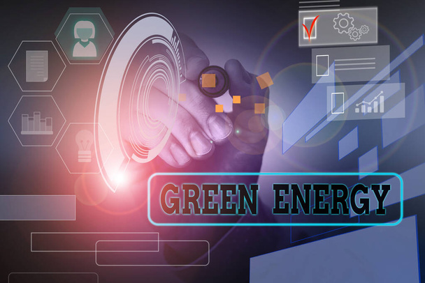 Handwriting text Green Energy. Concept meaning comes from natural sources and does not harm the ecosystem Male human wear formal work suit presenting presentation using smart device. - Photo, Image