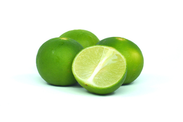 Fresh ripe lime. Isolated on white background - 写真・画像