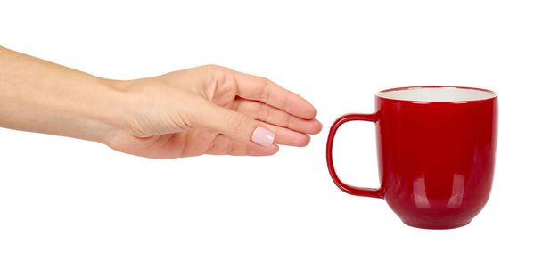 Red porcelain tea cup. Ceramic coffee mug. - Fotó, kép
