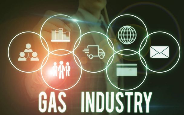 Writing note showing Gas Industry. Business photo showcasing global processes exploration and selling of petroleum products Woman wear formal work suit presenting presentation using smart device. - Photo, Image