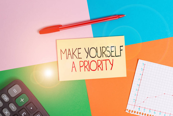 Word writing text Make Yourself A Priority. Business concept for Think in your own good first demonstratingal development Office appliance colorful square desk study supplies empty paper sticker. - Photo, Image