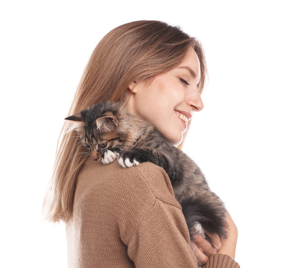 Young woman with cat on white background. Owner and pet - Photo, Image