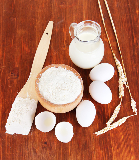 Ingredients for dough on wooden table close-up - 写真・画像