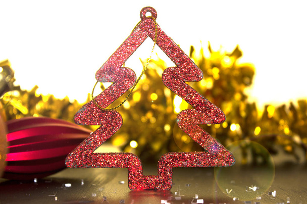 Christmas tree toy, Christmas gold and orange balls, back light, glow. Background for Xmas design - Photo, Image