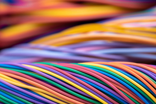 Multicolored electrical computer cable installation - Фото, изображение