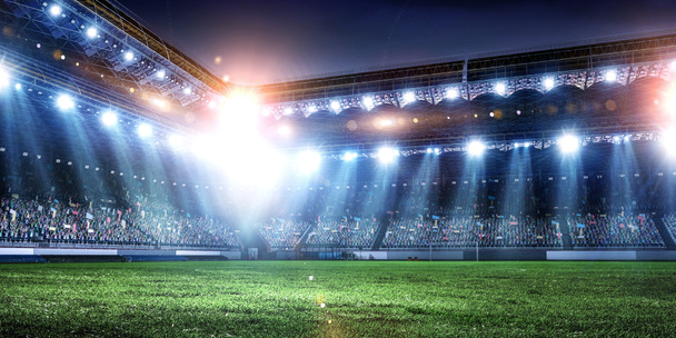 Повна нічна футбольна арена у вогні
 - Фото, зображення