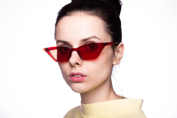young woman in red sunglasses - 写真・画像