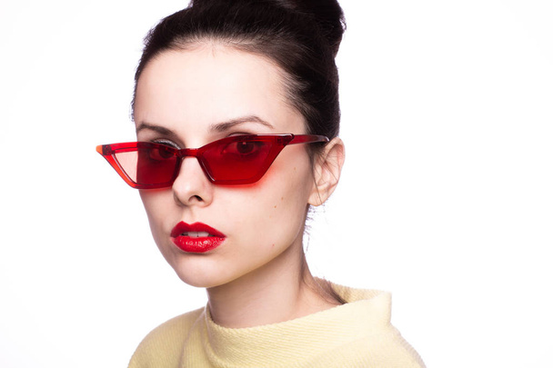 young woman in red sunglasses, red lipstick - Фото, зображення