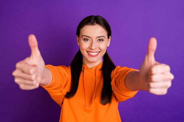 Close-up portrait of her she nice attractive cheerful content girl with pigtails giving two double thumbup perfect isolated over bright vivid shine vibrant violet purple lilac color background - Foto, Bild