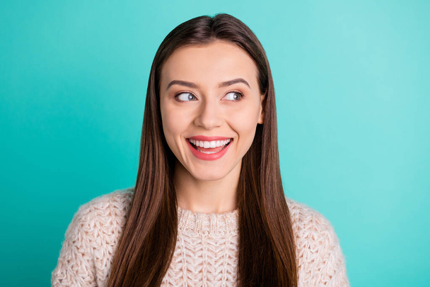 Close up photo of interested cheerful funny curious attractive pretty sweet girlfriend staring at something away smiling toothily wearing sweater isolated with turquoise vivid color background - Foto, Bild