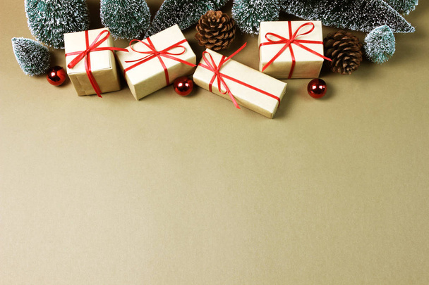 Christmas gift boxes and decorations on brown background. - Fotoğraf, Görsel