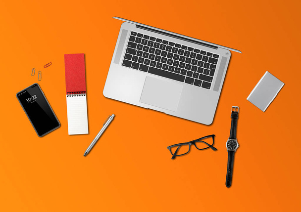 Office desk mockup top view isolated on orange - Photo, image
