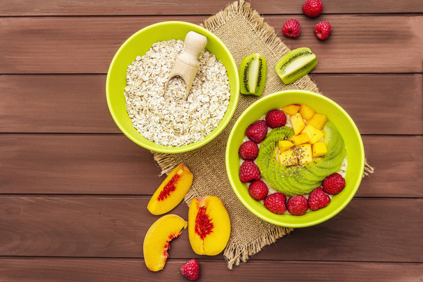 Oatmeal bowl with fresh berries and fruits - Photo, Image