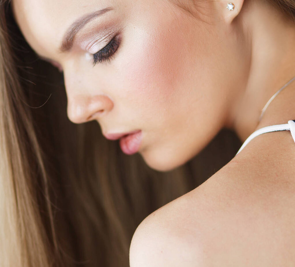Beautiful woman face close up studio on white - Φωτογραφία, εικόνα