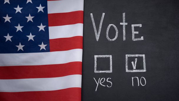 American flag on background, no answer marked in vote, parliament election - 写真・画像