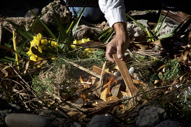 mayan priest setting alight ritual offerings - Photo, Image