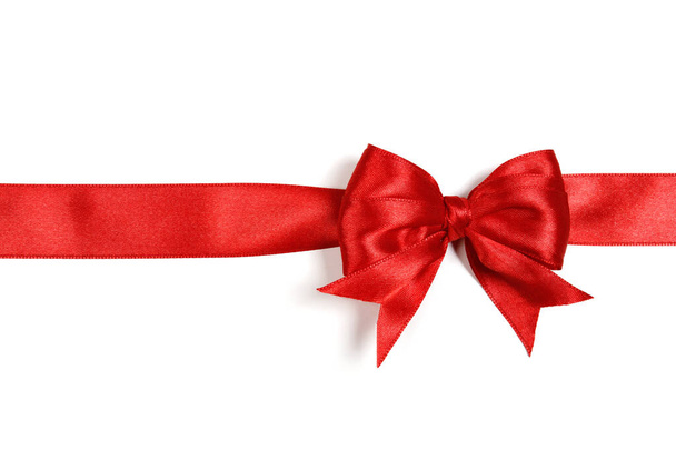 Shiny red satin ribbon on white background - Фото, зображення