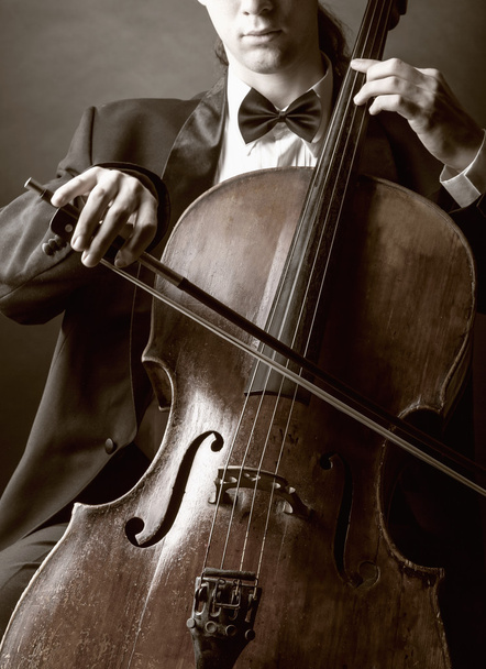 Tocar violoncelo
 - Foto, Imagem