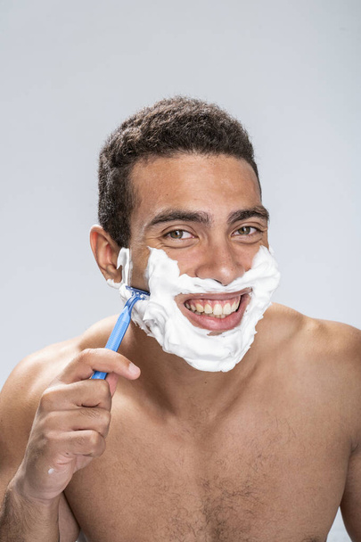 Cheerful male being happy changing his appearance - 写真・画像