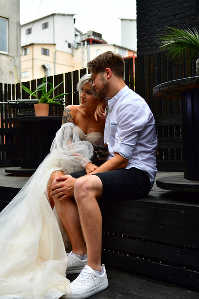 Happy young wedding couple kissing and hugging - Photo, Image