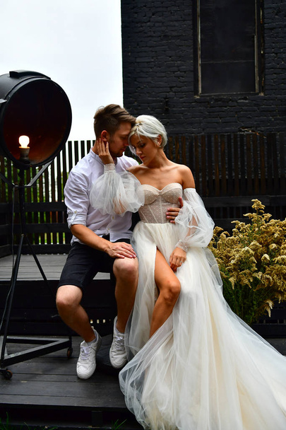 Happy young wedding couple kissing and hugging - Foto, Bild