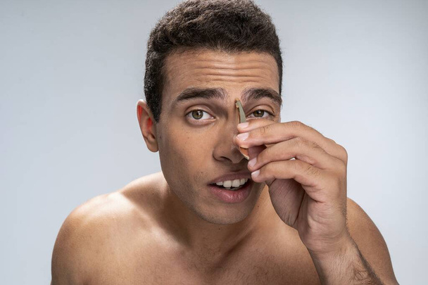 Man being in the middle of beauty procedure - Photo, Image