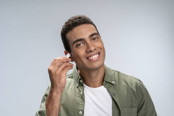Handsome male preparing for listening to music - Photo, Image